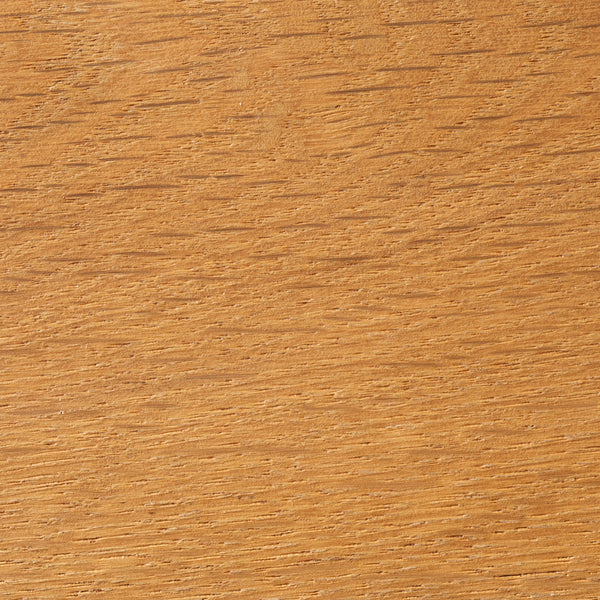 Close-up of a wooden surface with a warm brown color and visible grain.