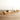 Long rectangle charcuterie board with handle on both ends. Relclaimed oak with natural color and wood grains. Shown with fruits and cheeses