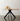 Round Table. Vintage Beechwood top. Blonde maple hues. Black matchstick base.