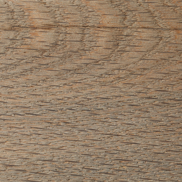Close-up of a wooden surface with a natural grain pattern in driftwood finish